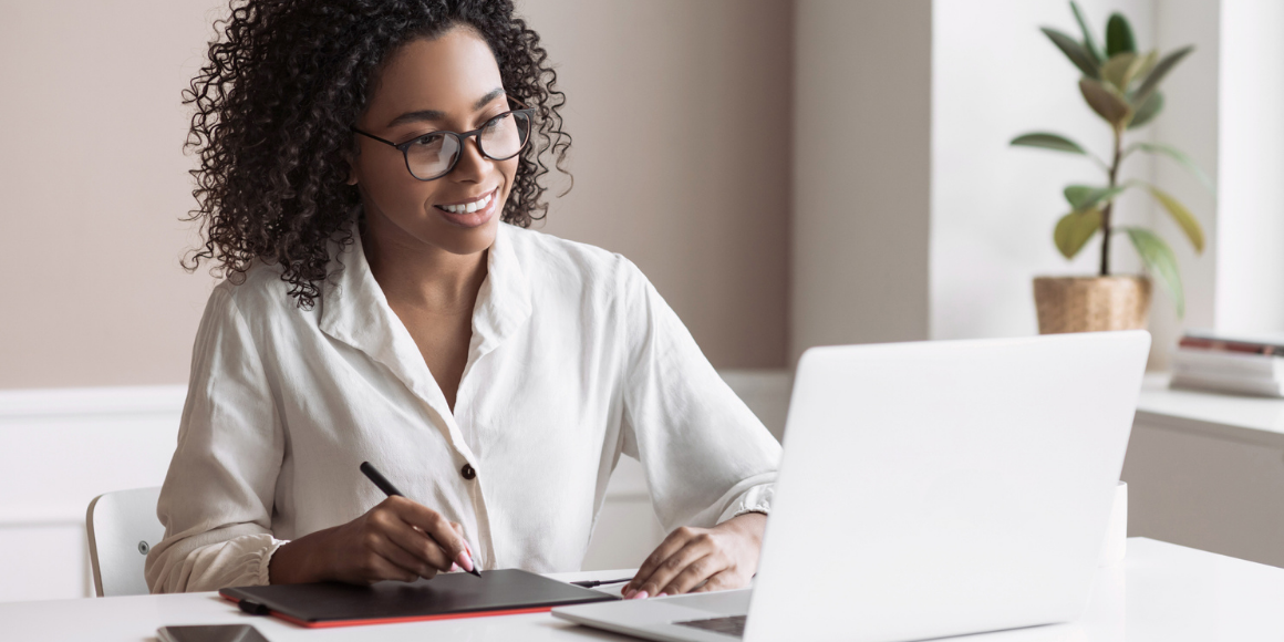 eteller woman on laptop